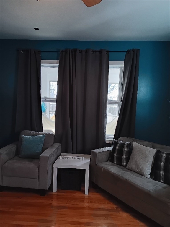 28 Barnard Road Worcester, MA 01605 - Photo 10 of 20 a living room with furniture and a window