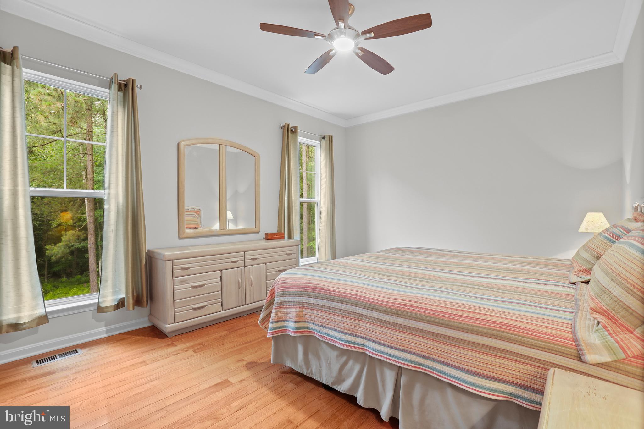 8264 Buckthorne Run King George, VA 22485 - Photo 24 of 50 a bedroom with a bed and a dresser