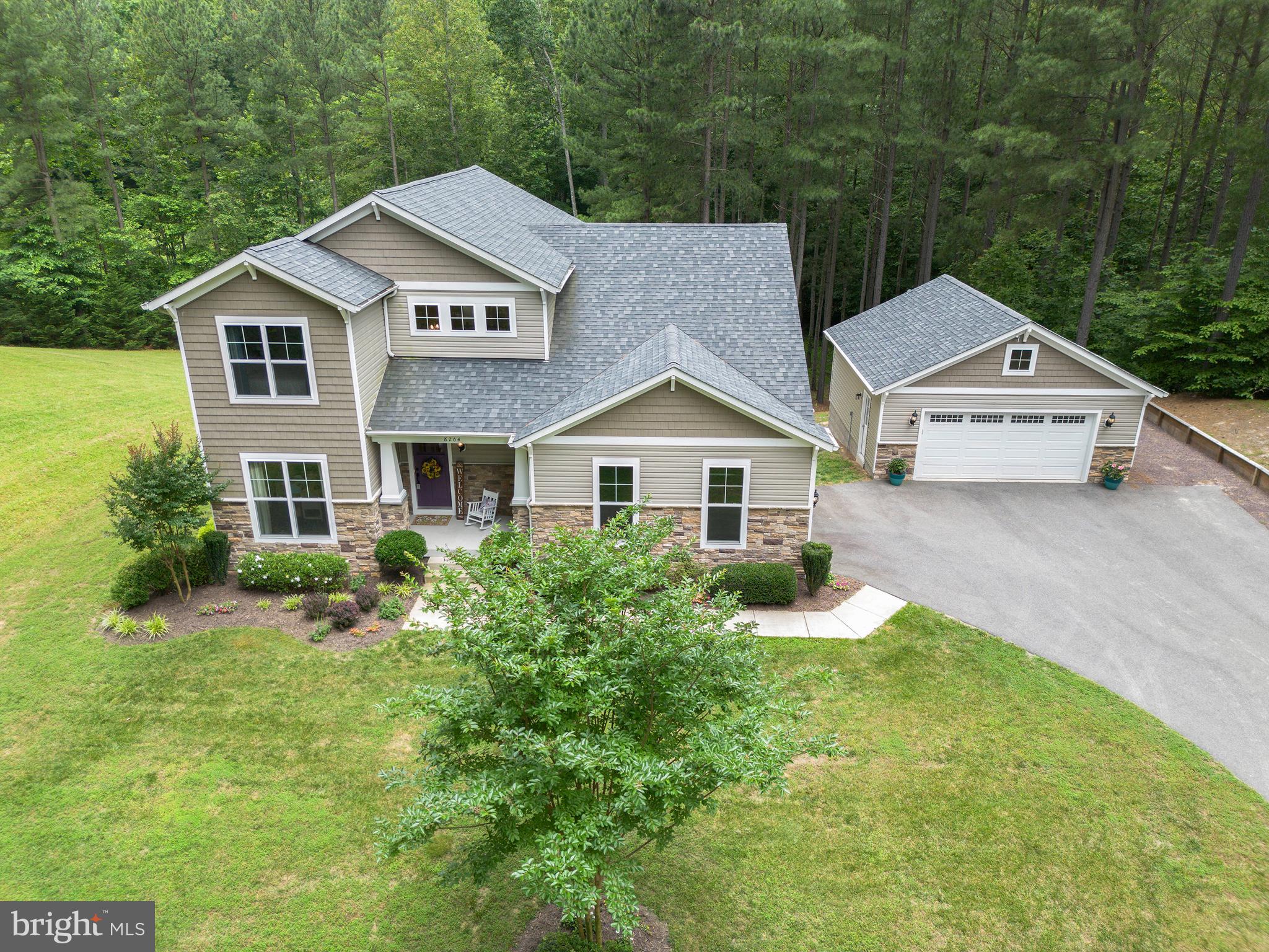 8264 Buckthorne Run King George, VA 22485 - Photo 44 of 50 a aerial view of a house with yard and green space