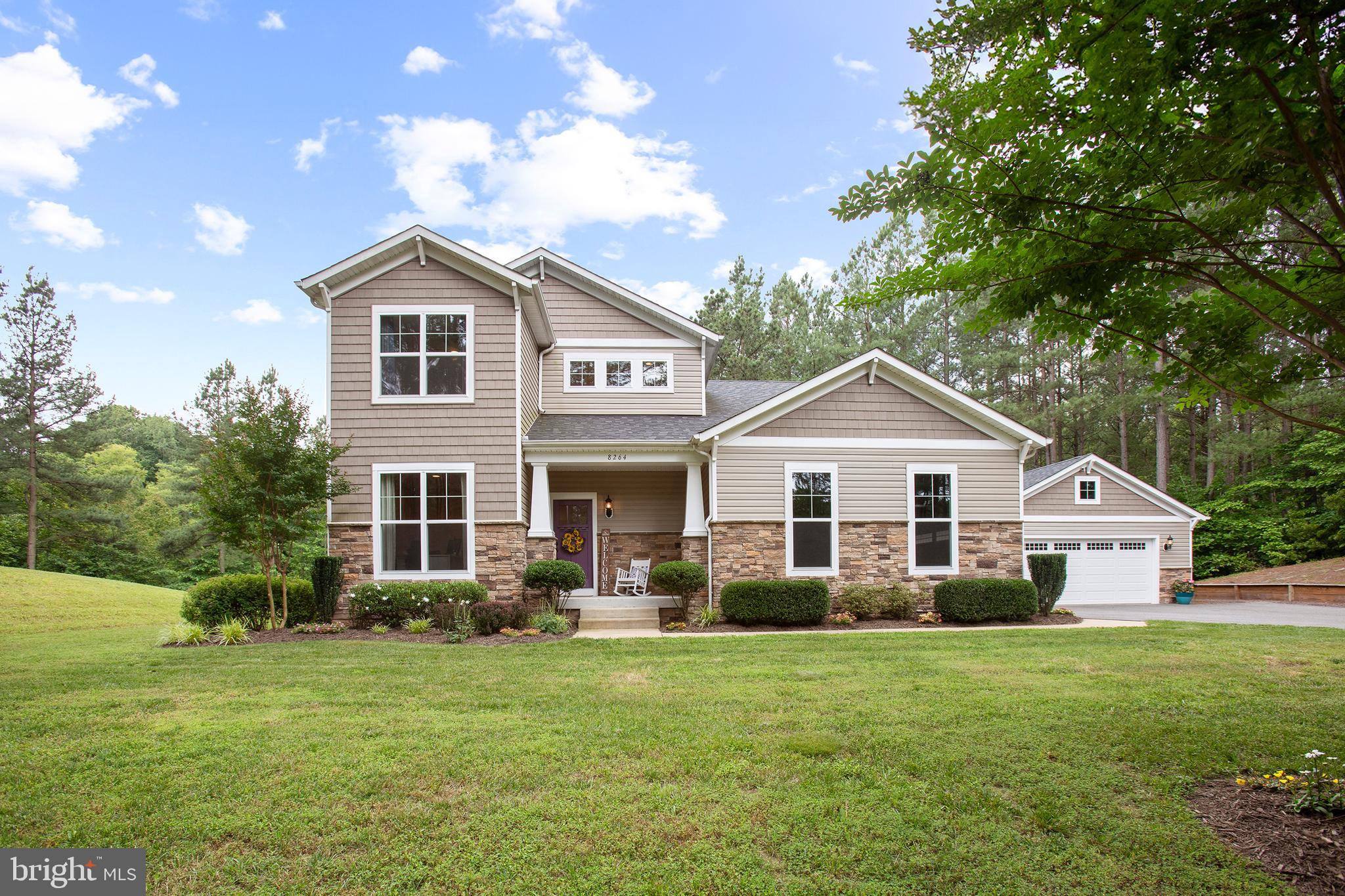 8264 Buckthorne Run King George, VA 22485 - Photo 50 of 50 a front view of a house with a yard