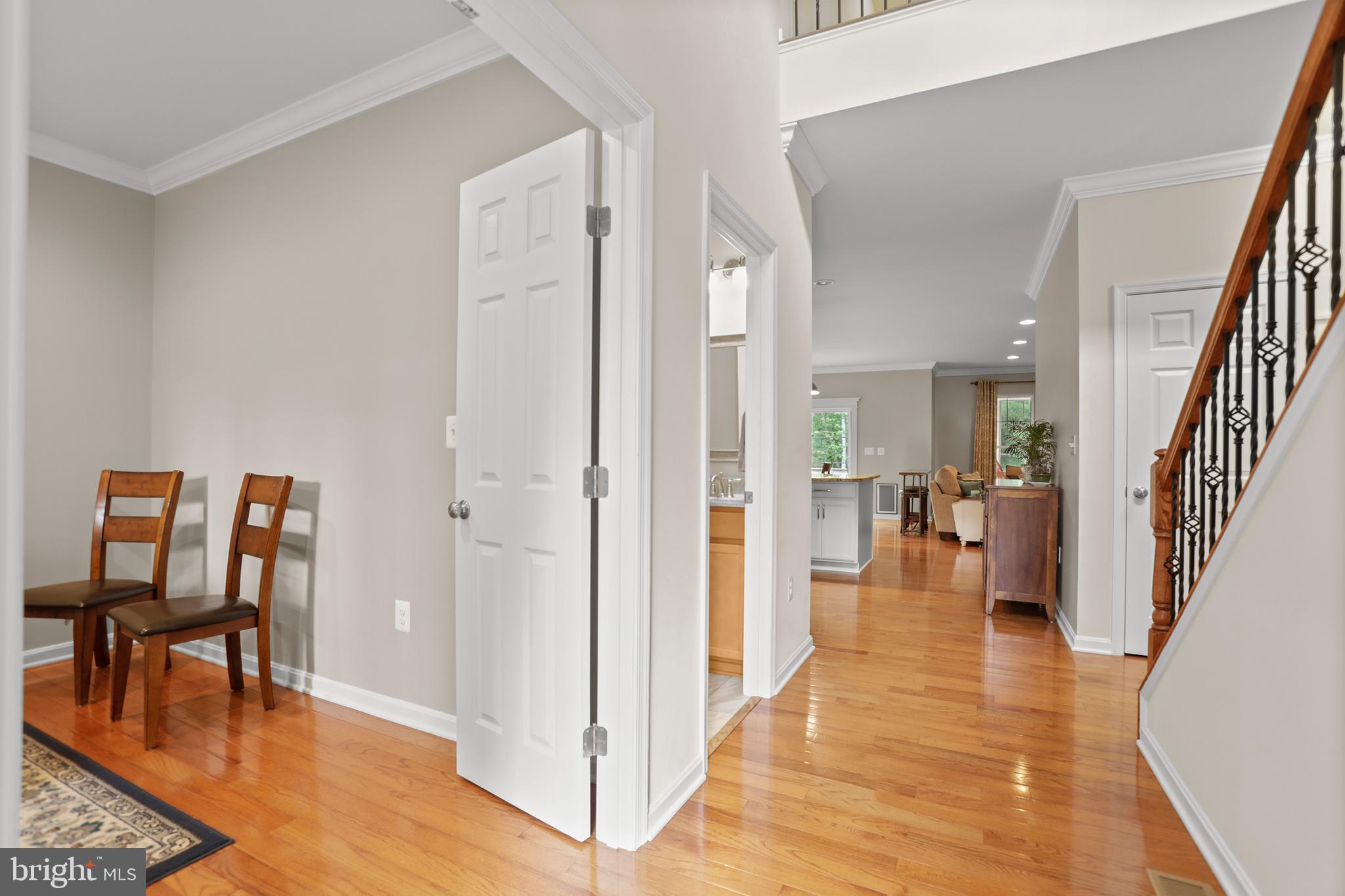 8264 Buckthorne Run King George, VA 22485 - Photo 5 of 50 a view of a livingroom with furniture and hardwood floor