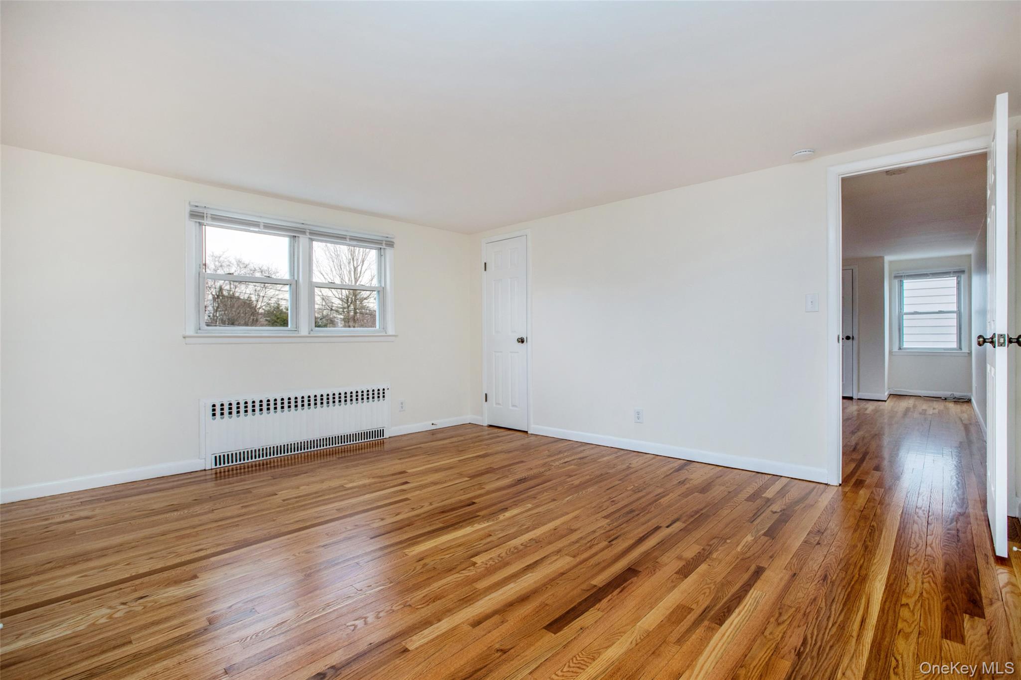 40 Division Street Rye Brook, NY 10573 - Photo 8 of 20 Beauty hardwood floors, window blinds already included.