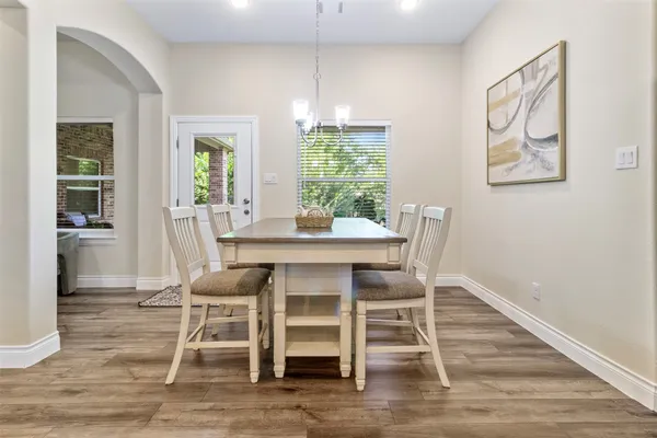 a dining room with furniture window wooden floor