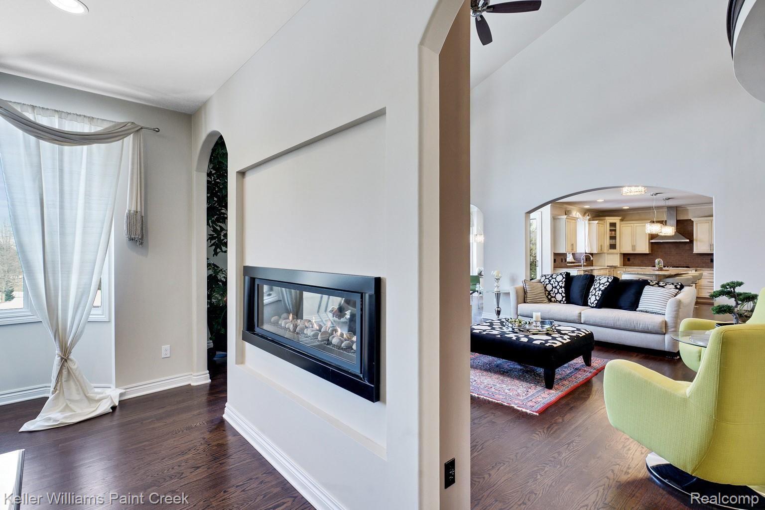 2926 Croftshire Court Rochester, MI 48306 - Photo 17 of 72 This dual-sided fireplace is so cool!