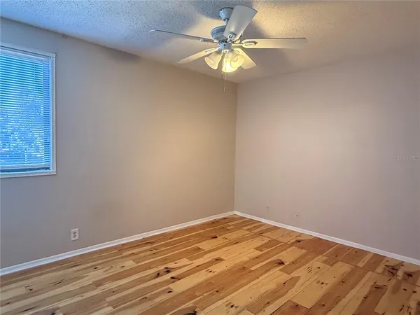 a view of a room that has a window in it