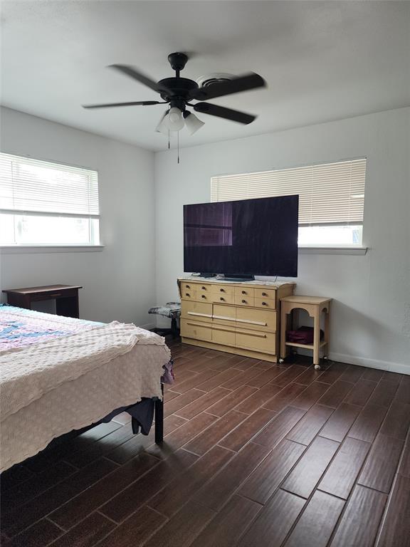 1714 Laurel Road Gainesville, TX 76240 - Photo 4 of 11 Bedroom with wood finish floors and ceiling fan