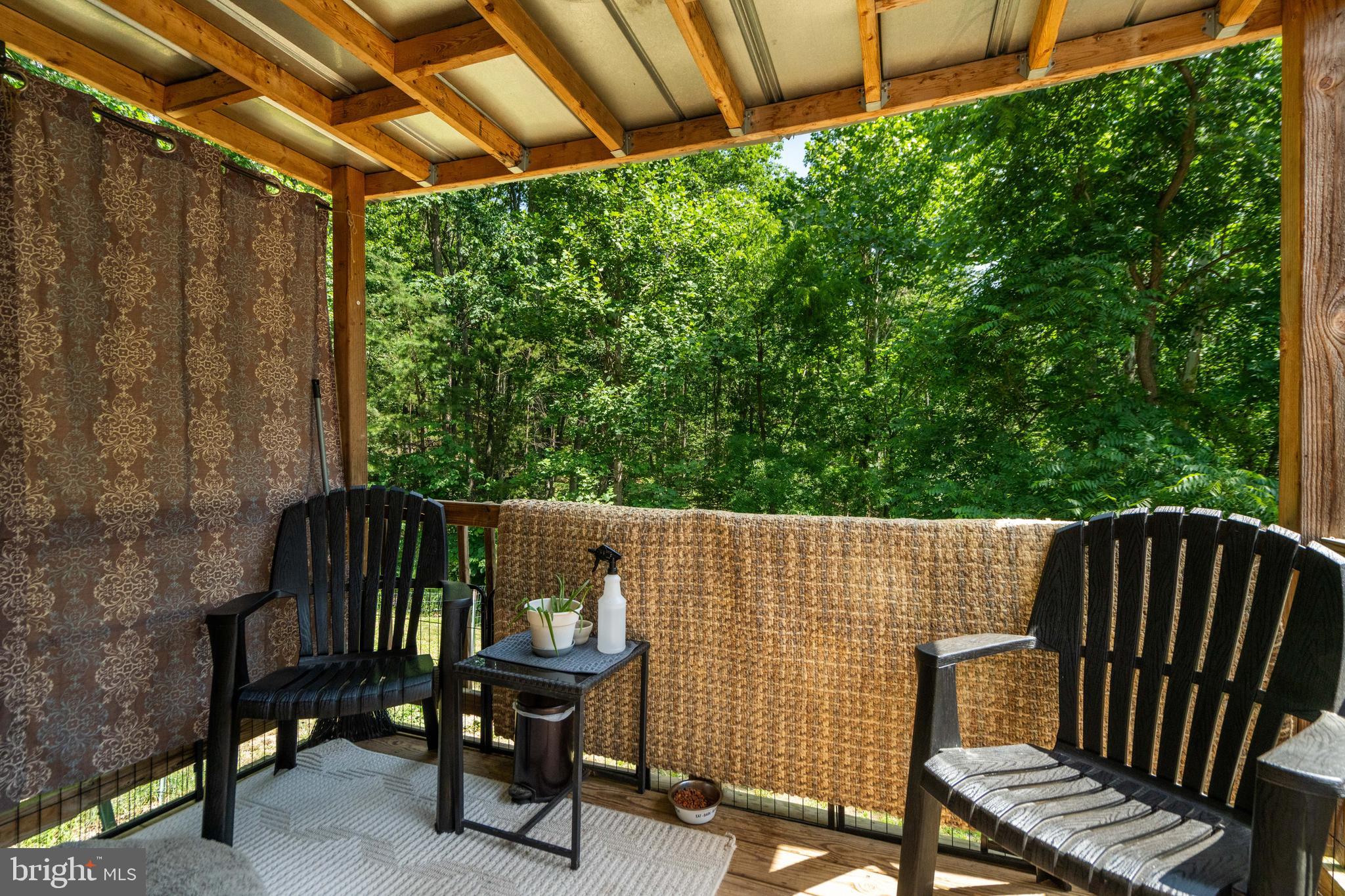1156 AA Rogers Road Augusta, WV 26704 - Photo 25 of 34 a view of a chair and table in the patio