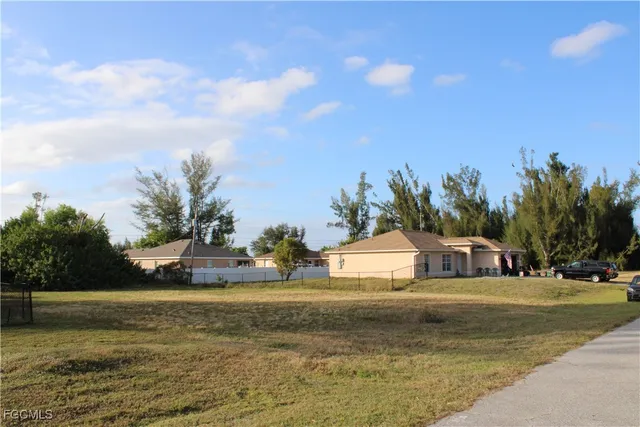 a view of street with houses