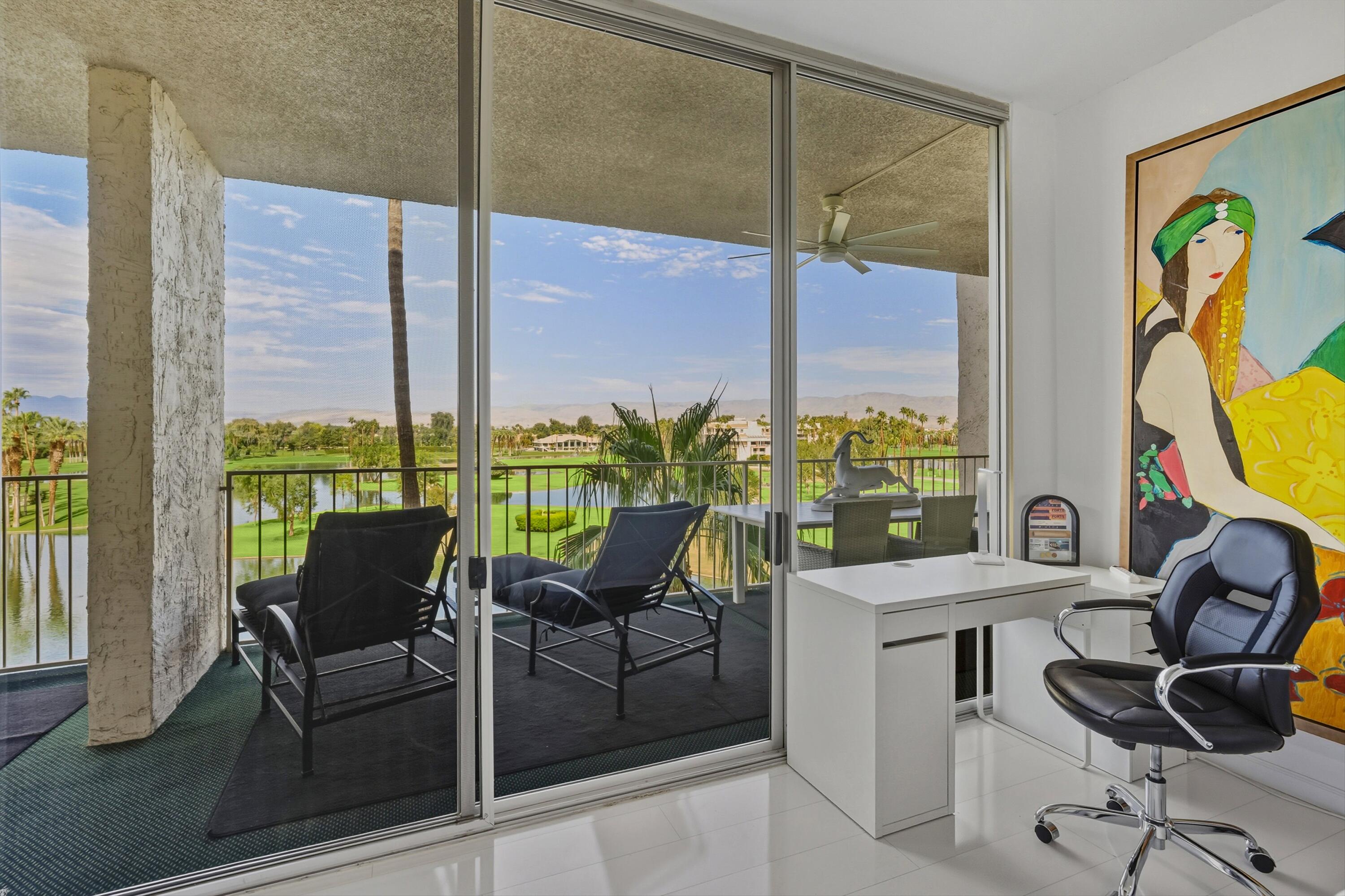 899 Island Drive, Unit 509 Rancho Mirage, CA 92270 - Photo 18 of 32 a work room with large windows