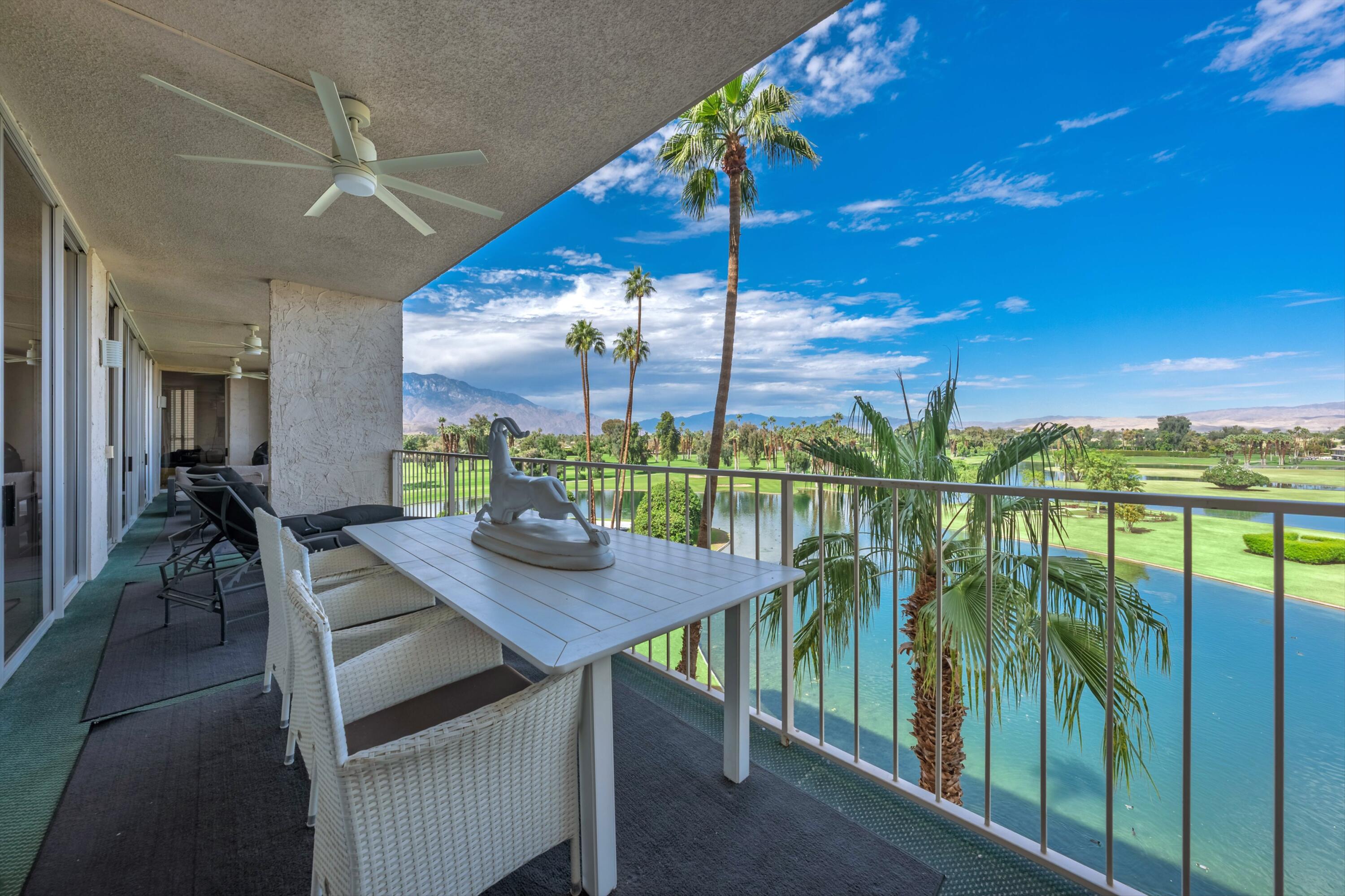899 Island Drive, Unit 509 Rancho Mirage, CA 92270 - Photo 28 of 32 a view of a patio with swimming pool
