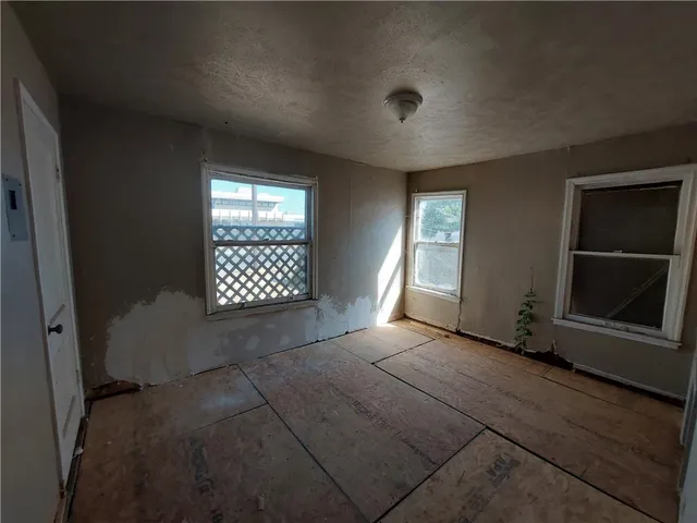 an empty room with windows