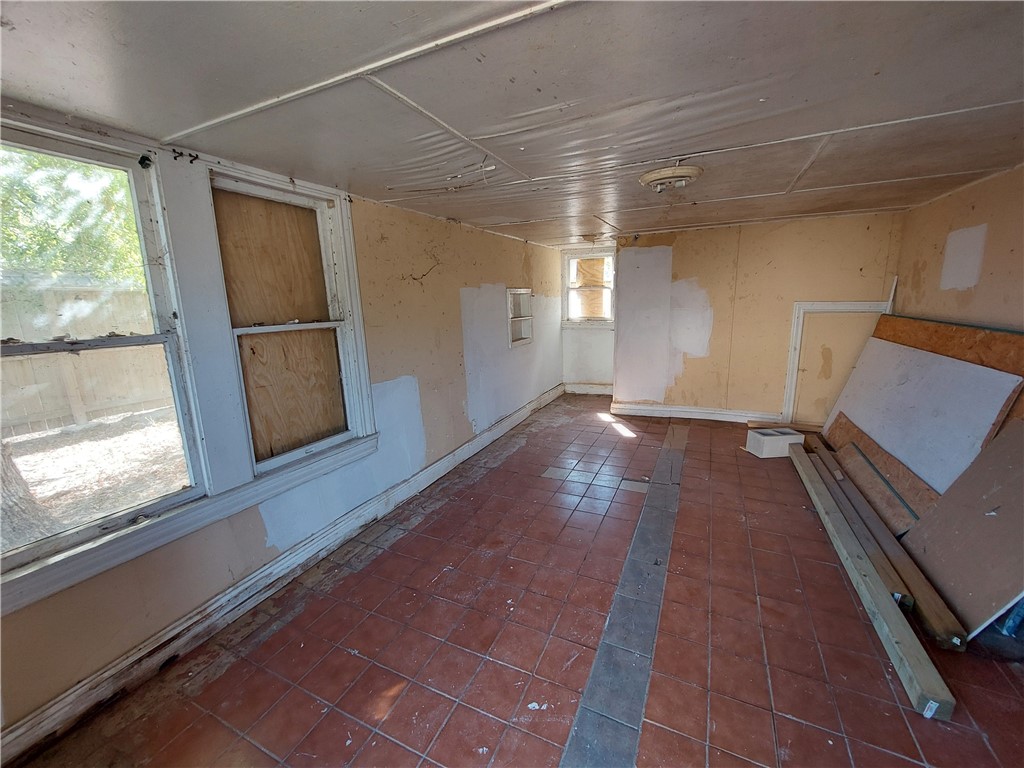 1731 15th Street Corpus Christi, TX 78404 - Photo 16 of 20 a view of a room with window and wooden floor