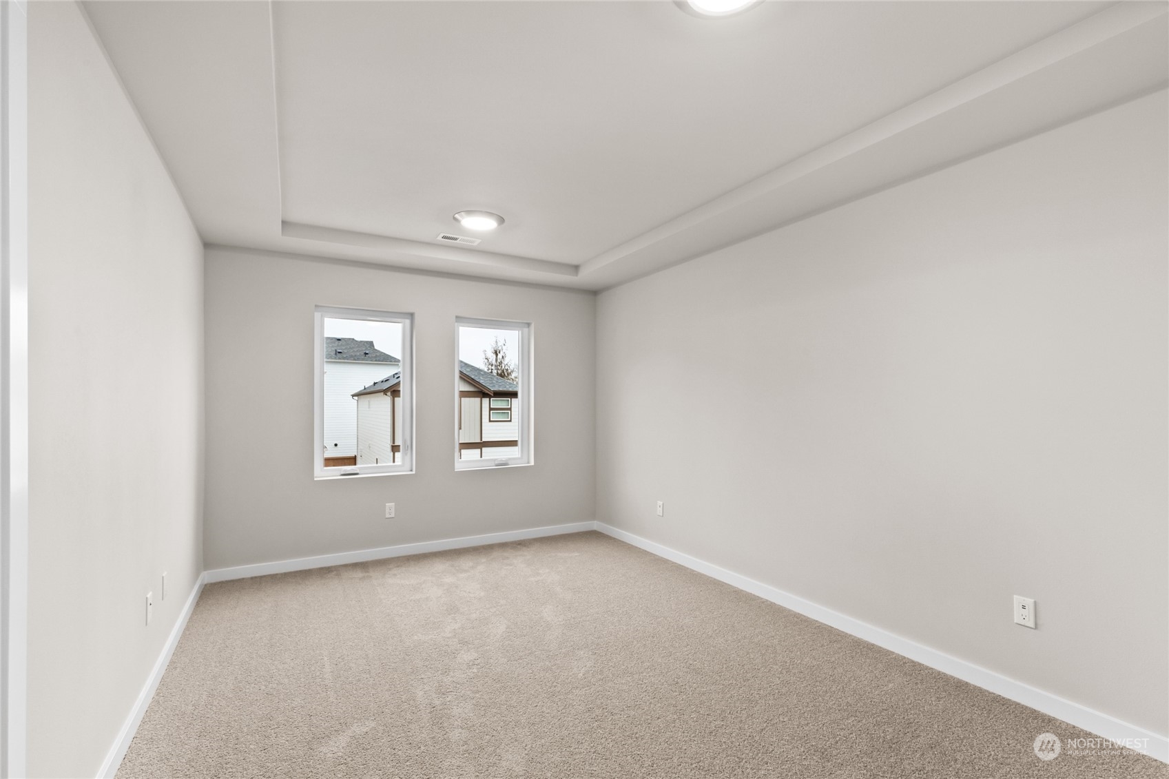 413 207th Street Southeast Bothell, WA 98012 - Photo 18 of 32 an empty room with windows