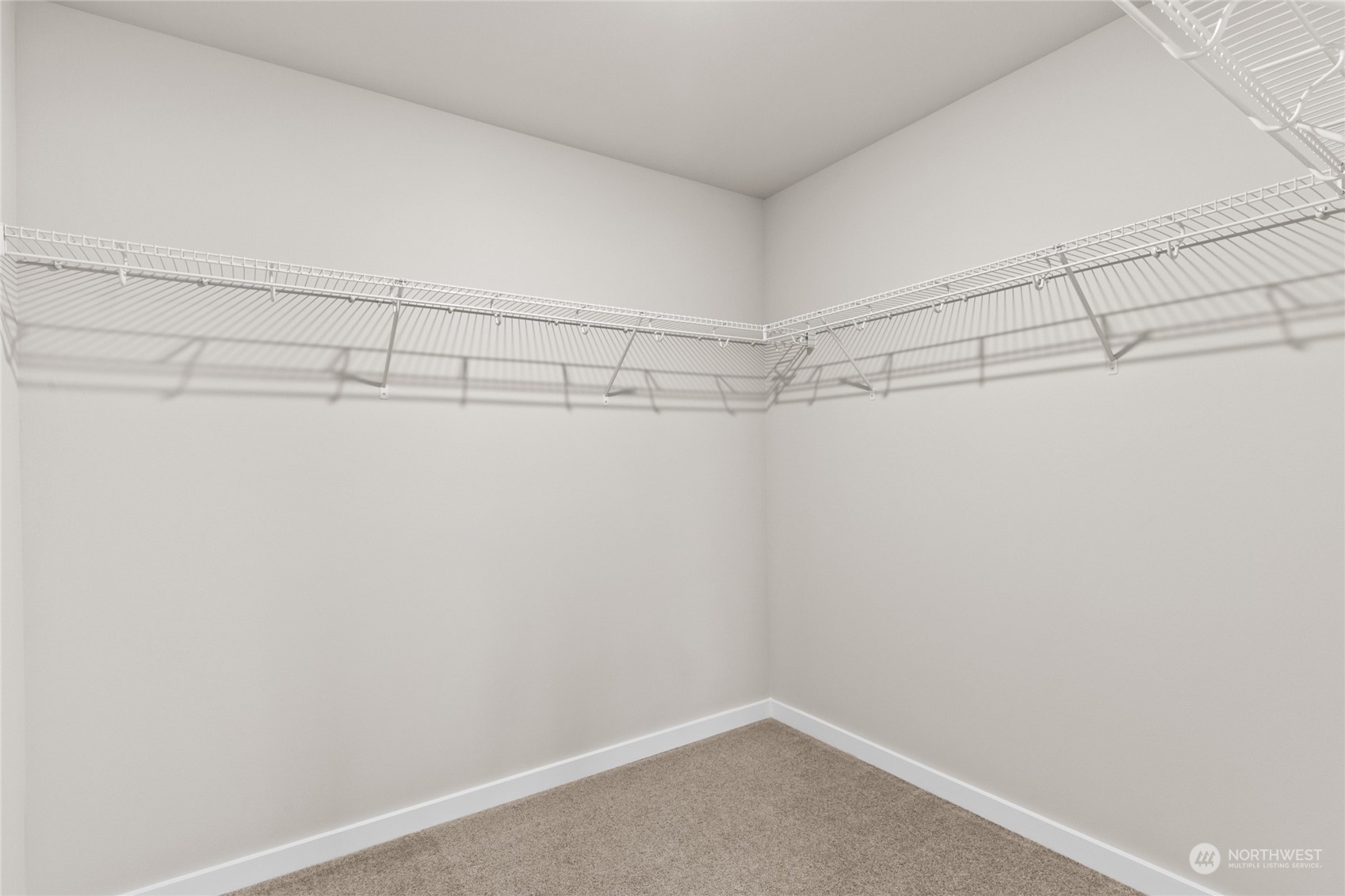 413 207th Street Southeast Bothell, WA 98012 - Photo 20 of 32 a view of a room with racks on the wall