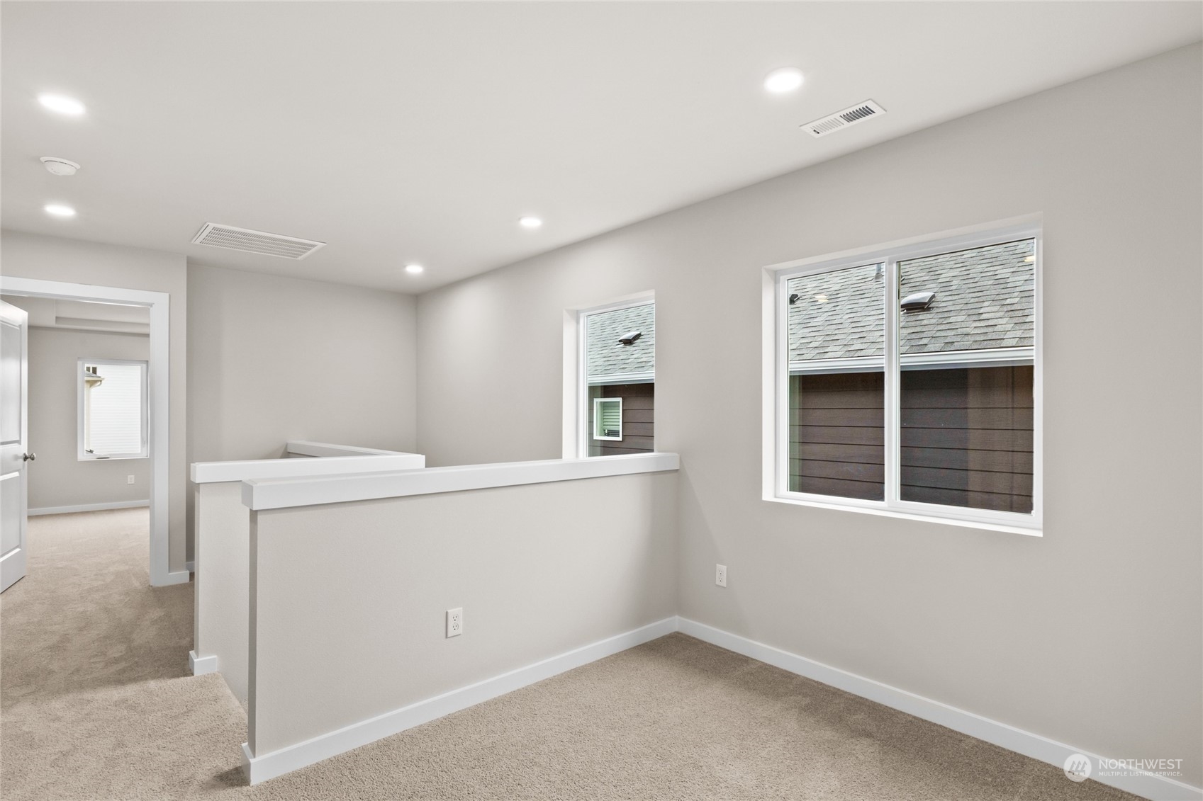 413 207th Street Southeast Bothell, WA 98012 - Photo 21 of 32 a view of an empty room with a window