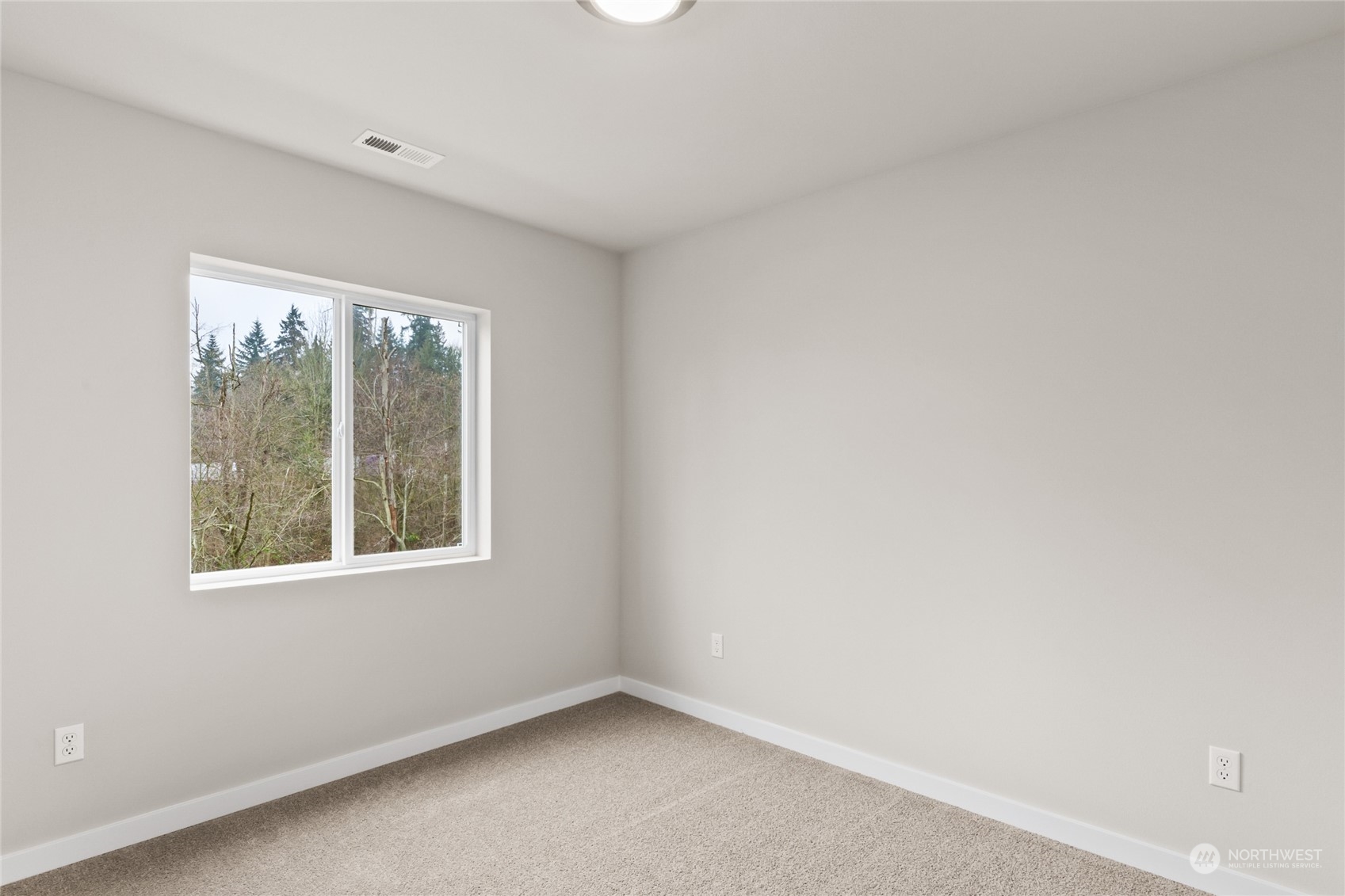 413 207th Street Southeast Bothell, WA 98012 - Photo 24 of 32 an empty room with a window