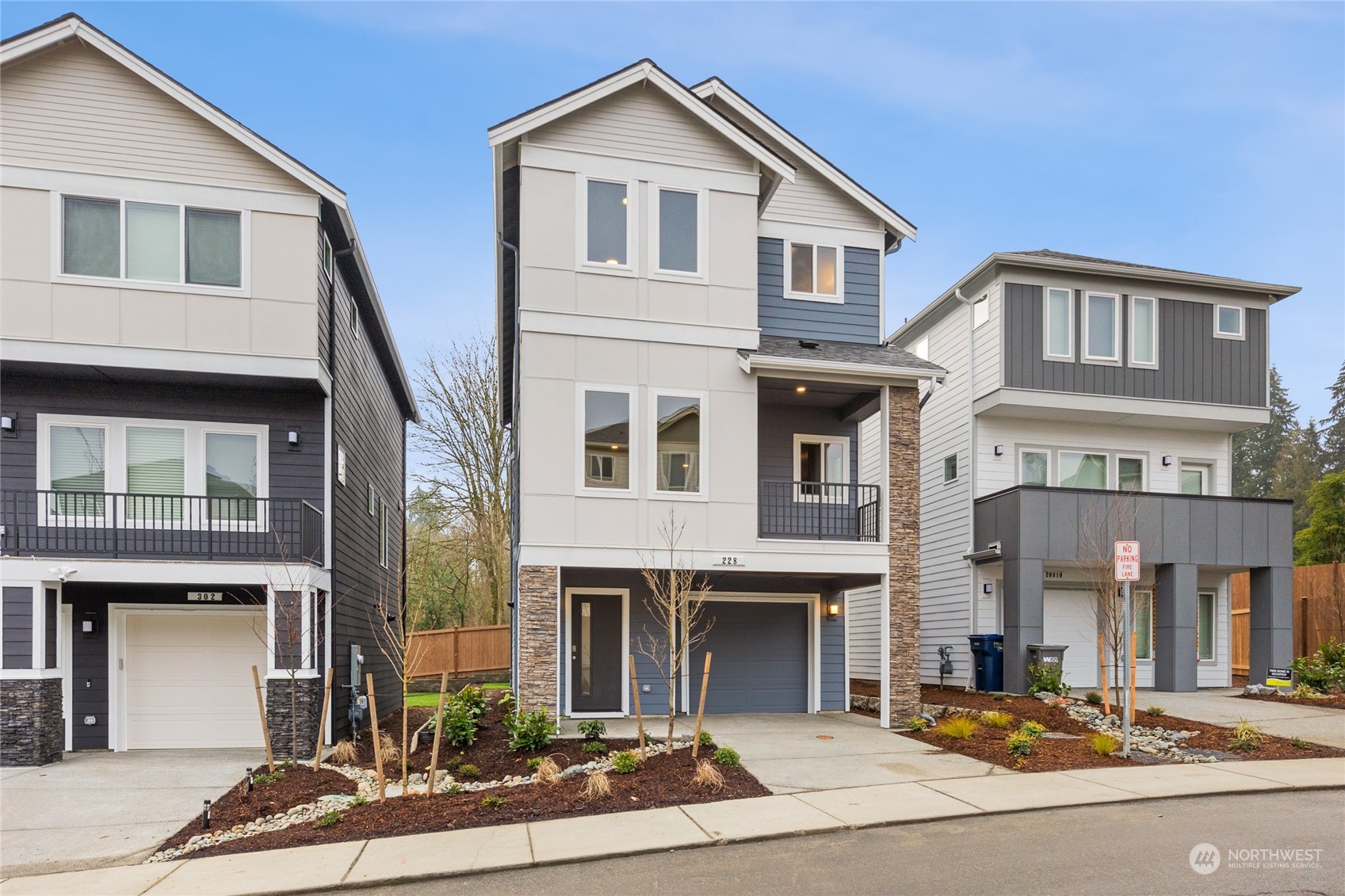 413 207th Street Southeast Bothell, WA 98012 - Photo 31 of 32 a front view of a residential houses with yard