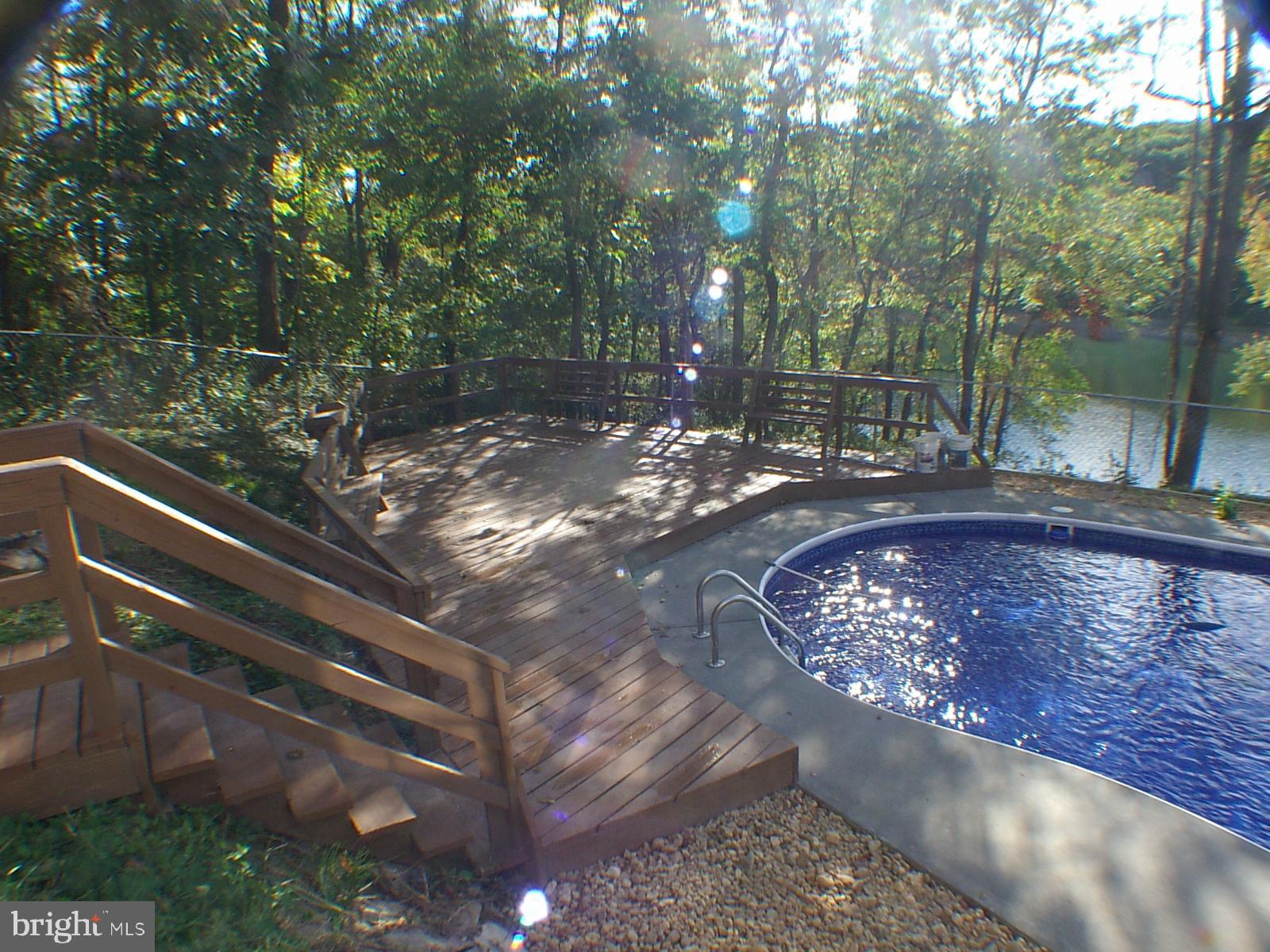 a view of a backyard with street view