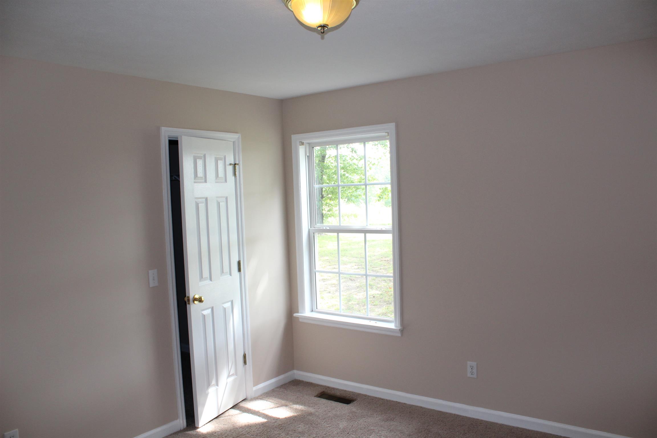 278 Baker Road Dickson, TN 37055 - Photo 17 of 26 a view of an empty room with window and closet area