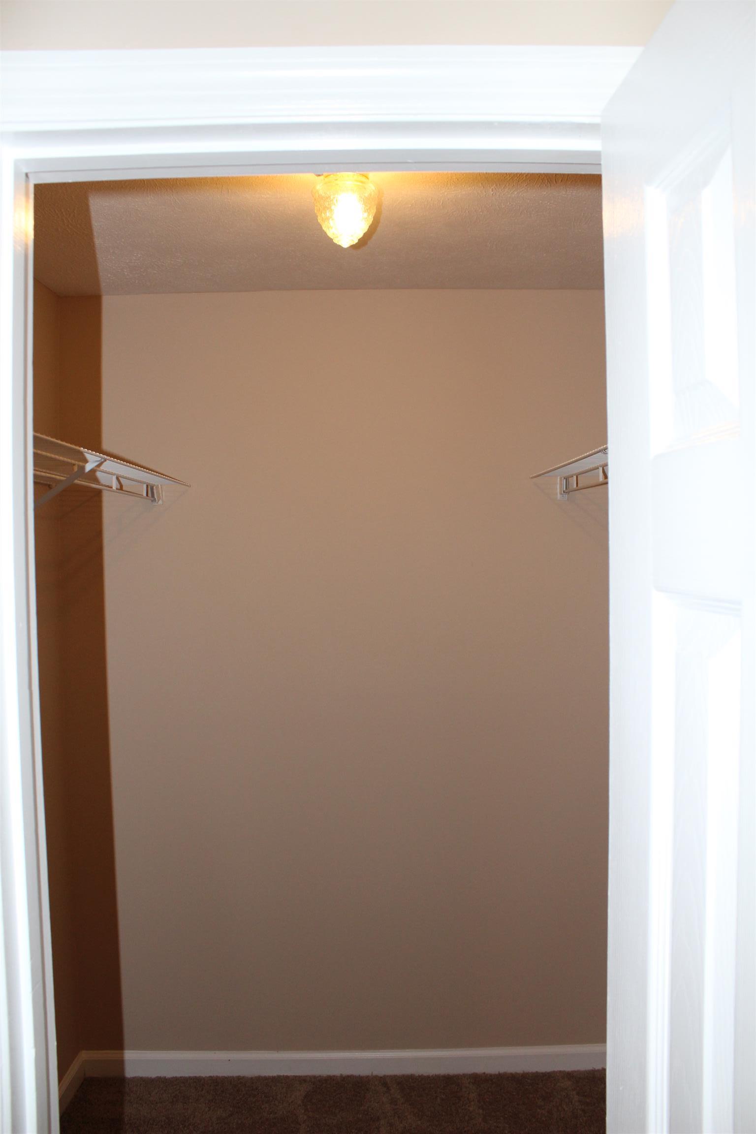 278 Baker Road Dickson, TN 37055 - Photo 19 of 26 a view of a closet with wooden floor