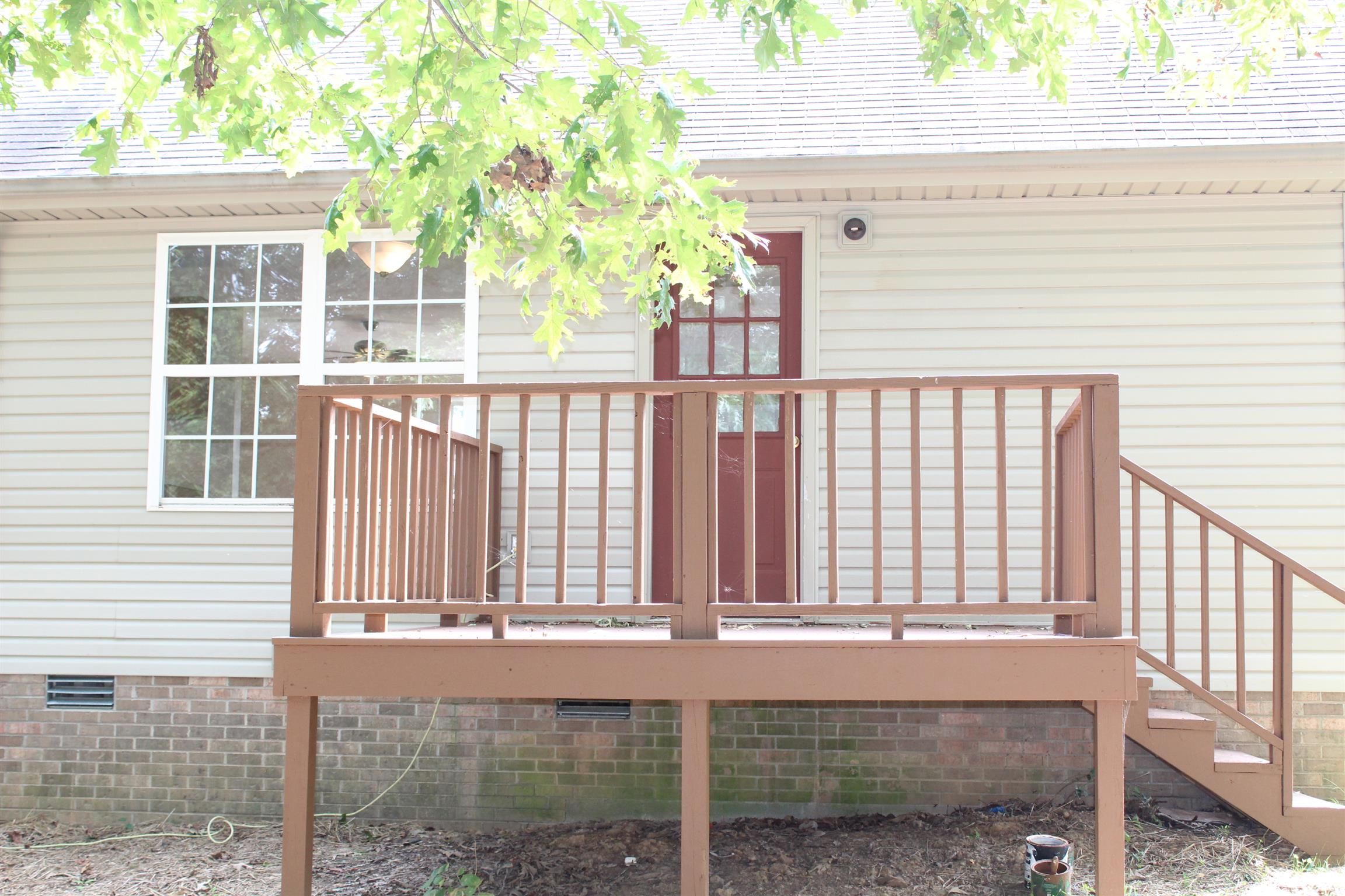 278 Baker Road Dickson, TN 37055 - Photo 24 of 26 a view of a house with a yard and sitting area