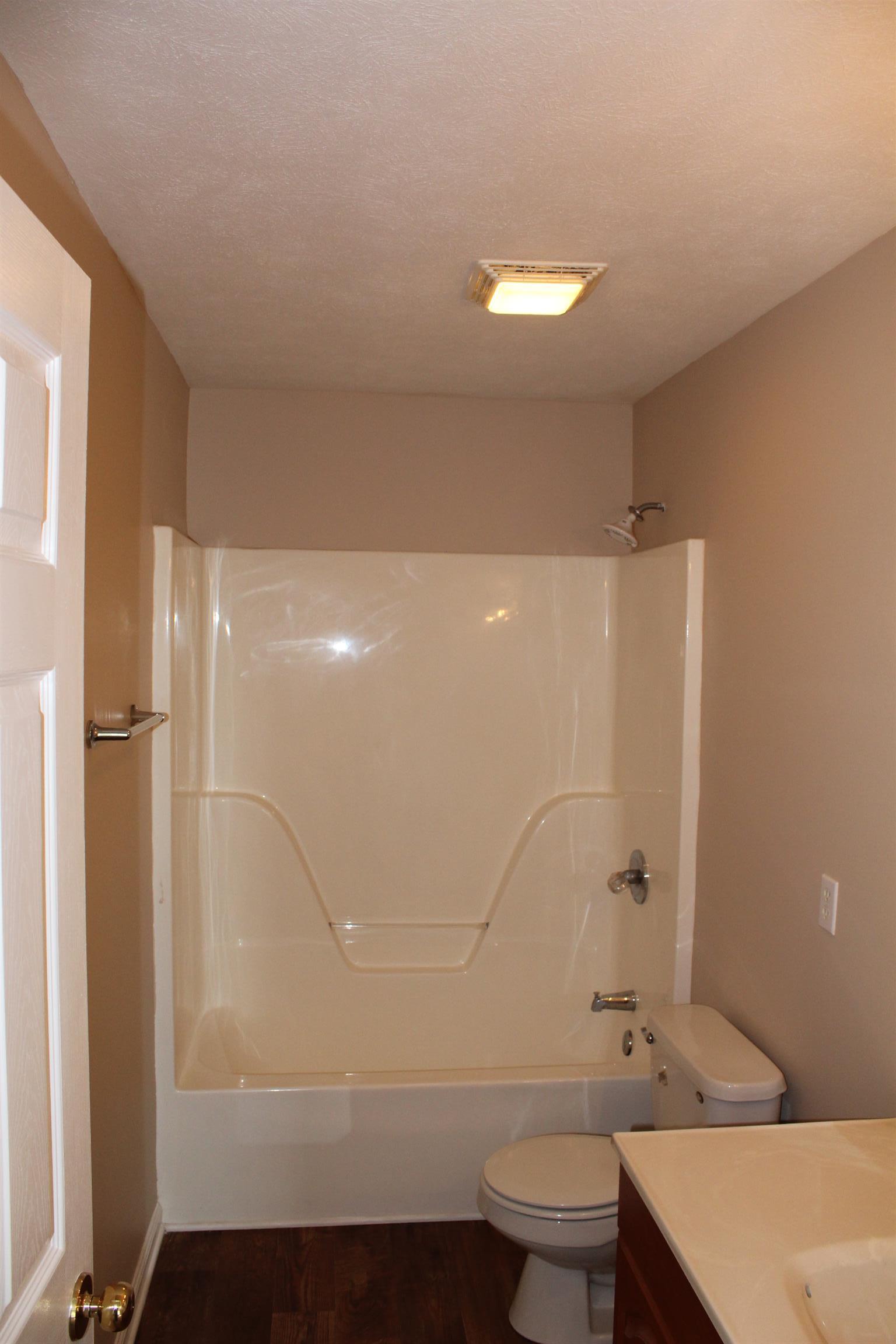 278 Baker Road Dickson, TN 37055 - Photo 9 of 26 a bathroom with a sink a toilet and shower