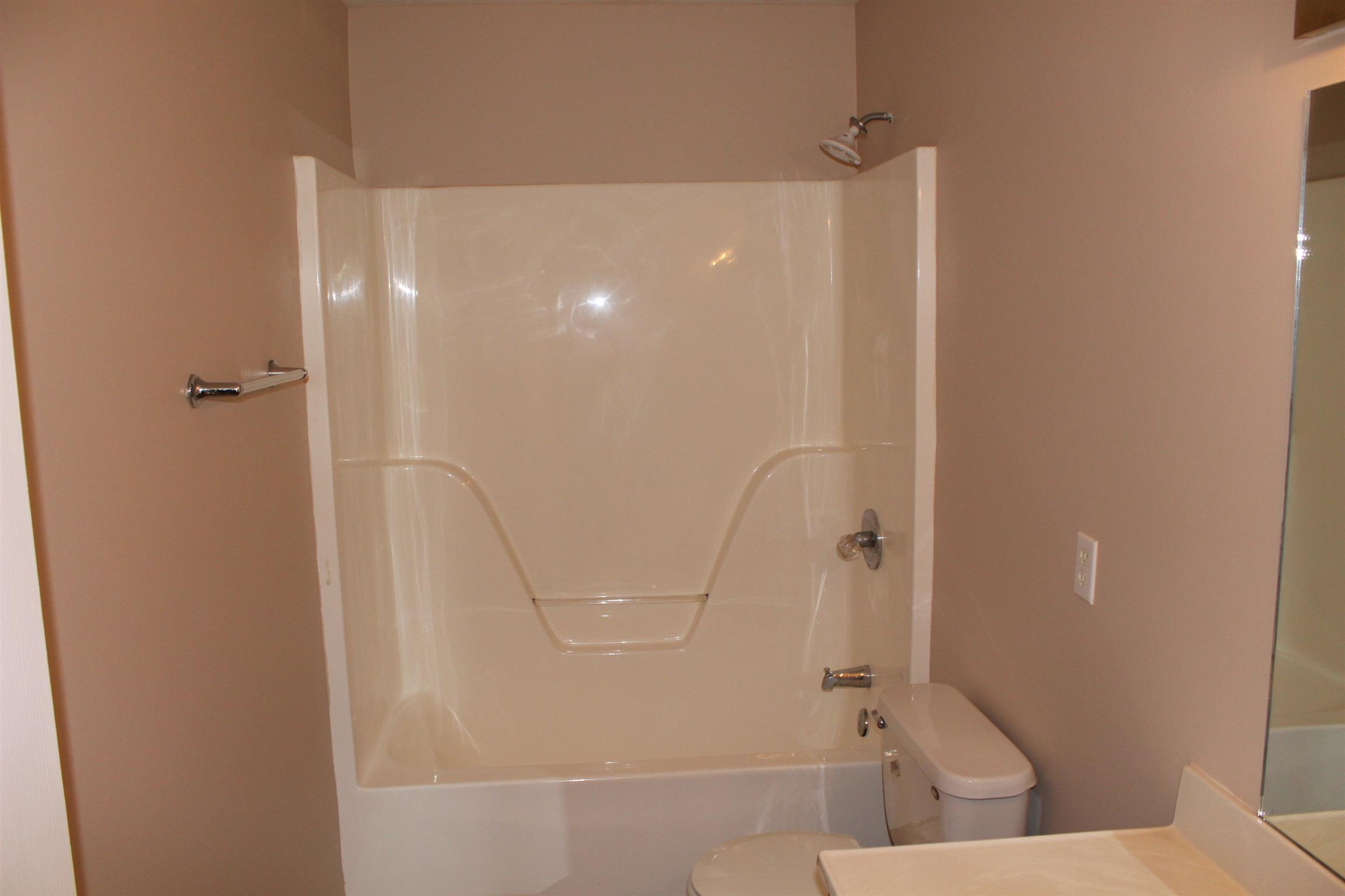 278 Baker Road Dickson, TN 37055 - Photo 10 of 26 a bathroom with a shower and toilet