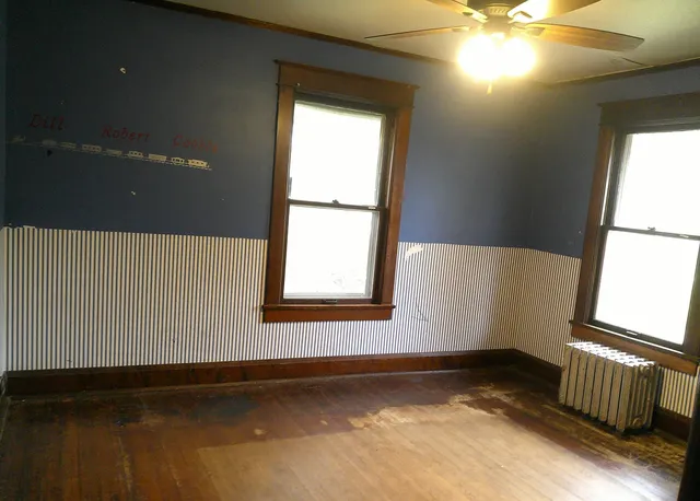 an empty room with windows