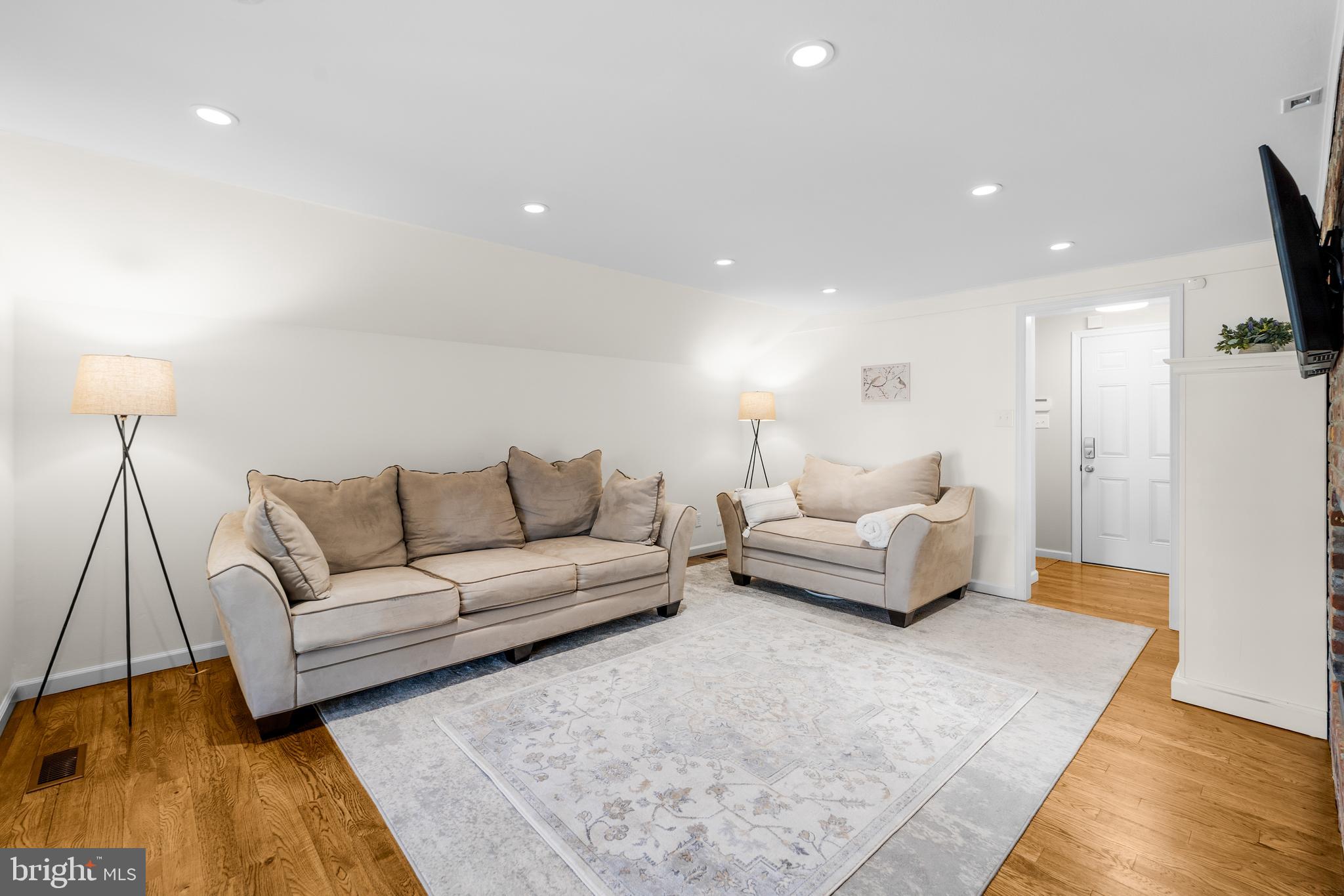 60 Pine Valley Road Cherry Hill, NJ 08034 - Photo 12 of 30 a living room with furniture and a flat screen tv