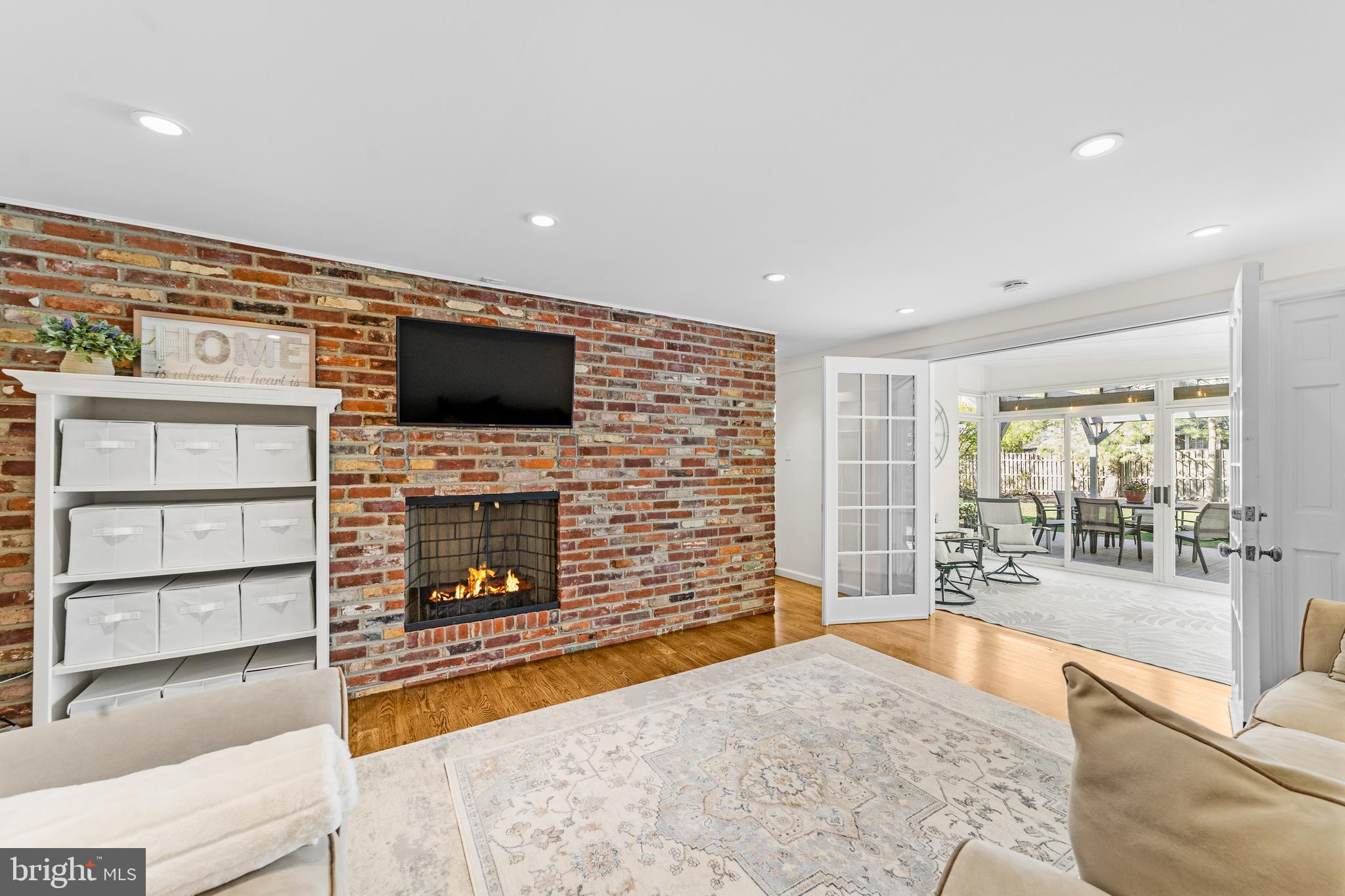 60 Pine Valley Road Cherry Hill, NJ 08034 - Photo 13 of 30 a living room with furniture a fireplace and a flat screen tv