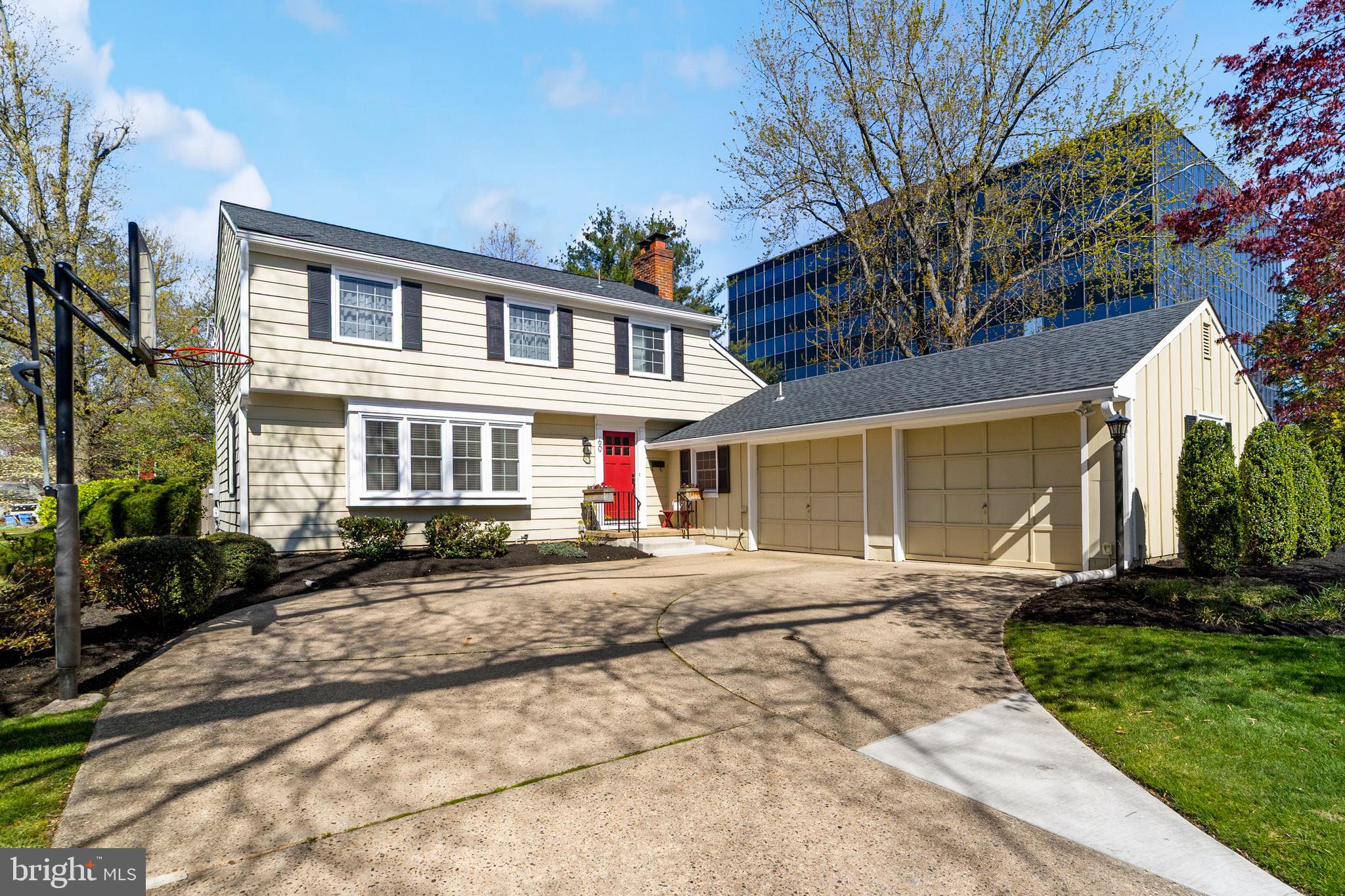 60 Pine Valley Road Cherry Hill, NJ 08034 - Photo 2 of 30 a front view of a house with a yard outdoor seating and garage