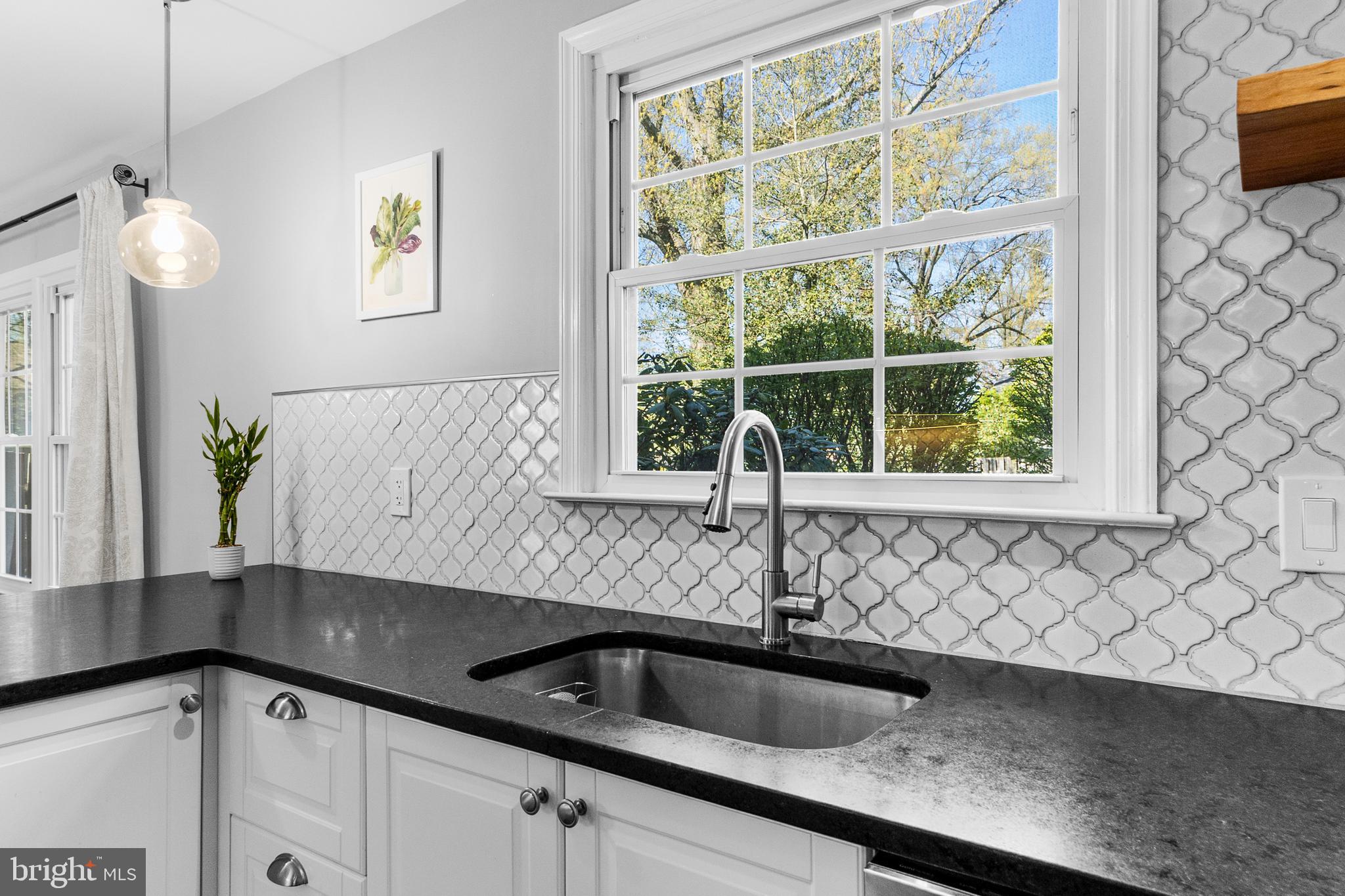 60 Pine Valley Road Cherry Hill, NJ 08034 - Photo 8 of 30 a kitchen with a sink and a window