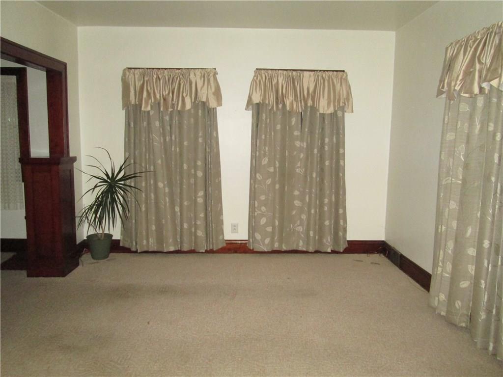 396 Virginia Avenue Rochester, PA 15074 - Photo 4 of 14 Living room Window Treatments do not stay in this room