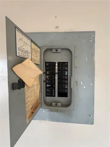 a view of a hallway with washer and dryer