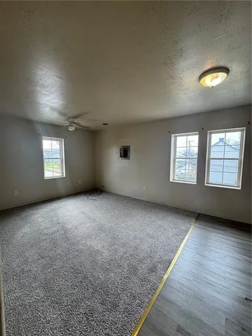 an empty room with windows