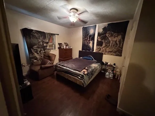 a bathroom with a sink toilet and mirror