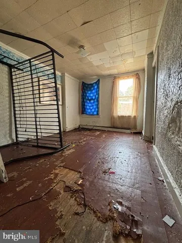 a view of empty room with windows