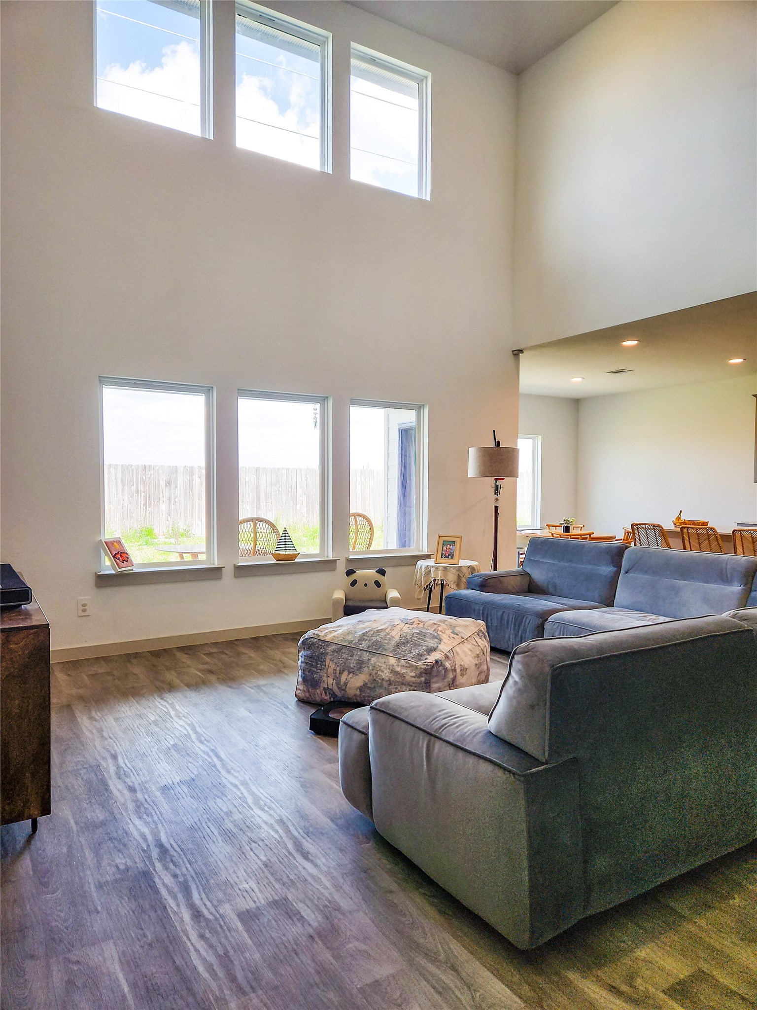 7219 Sunbreeze Lane Rosenberg, TX 77469 - Photo 2 of 18 a living room with furniture and a large window