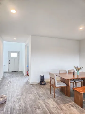 a view of a livingroom with furniture and rug