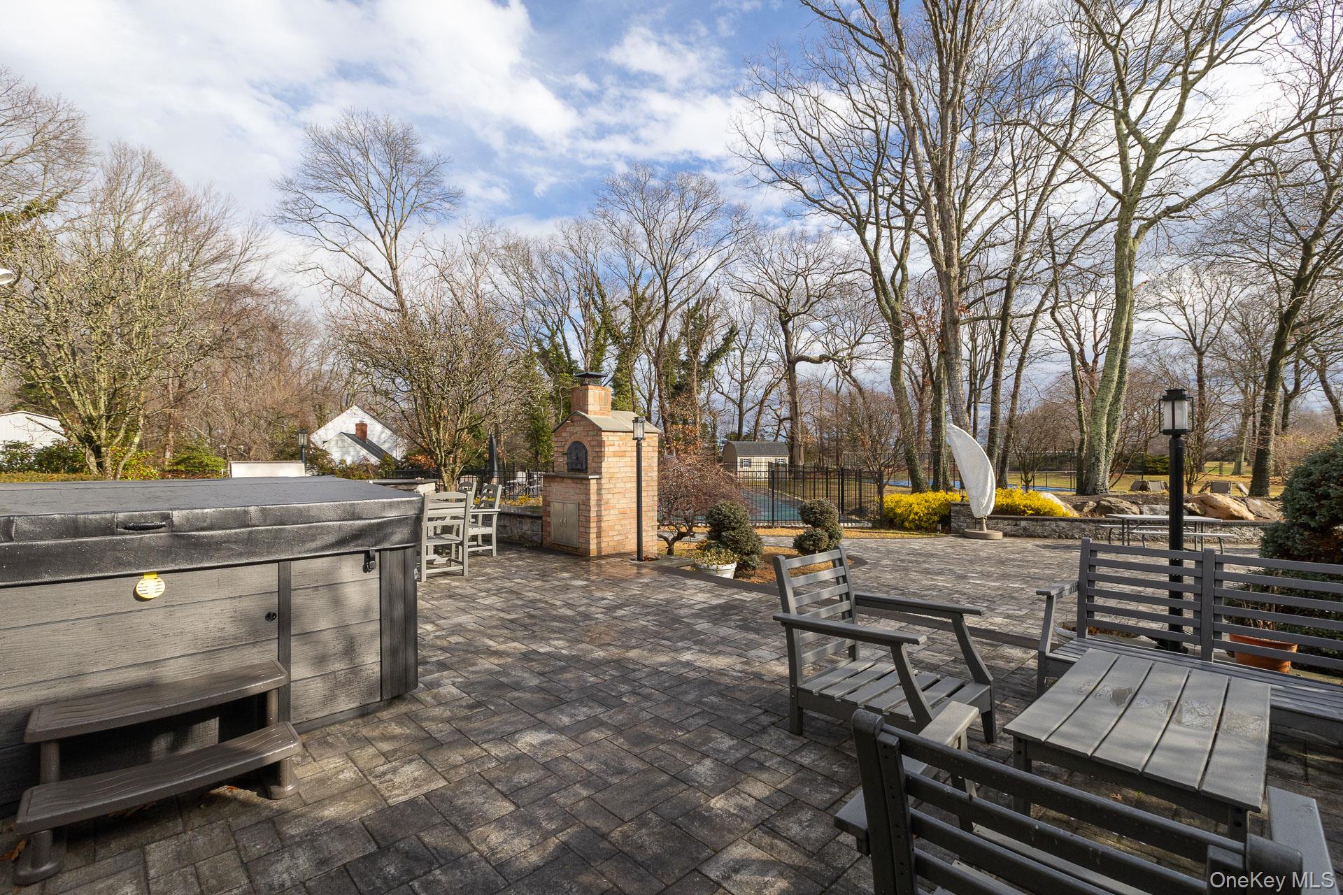 83 Cliff Road Port Jefferson, NY 11777 - Photo 15 of 50 a view of a yard with furniture and trees