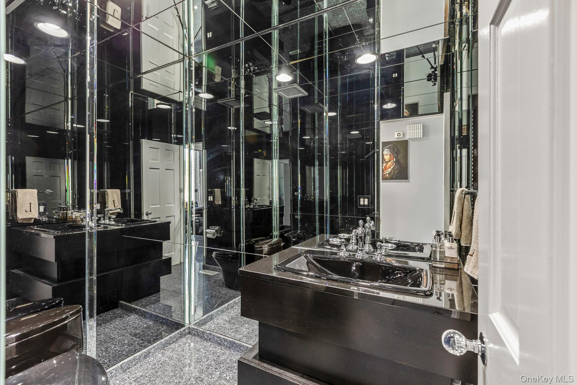 83 Cliff Road Port Jefferson, NY 11777 - Photo 24 of 50 a room with table and chairs