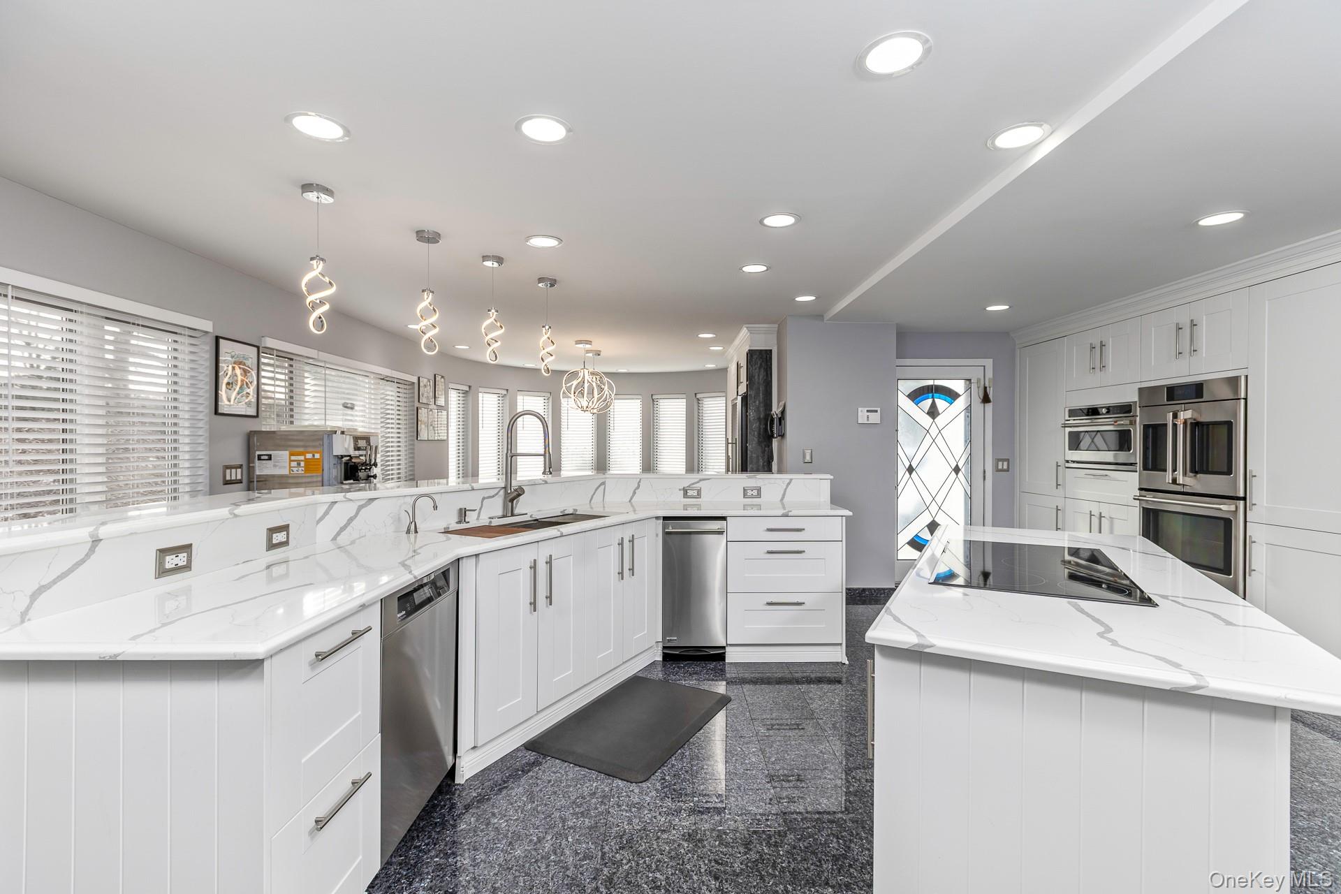 83 Cliff Road Port Jefferson, NY 11777 - Photo 27 of 50 a kitchen with sink stove and refrigerator