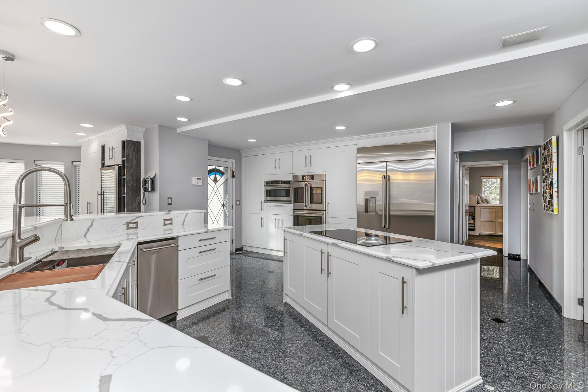 83 Cliff Road Port Jefferson, NY 11777 - Photo 28 of 50 a kitchen with sink stove and refrigerator