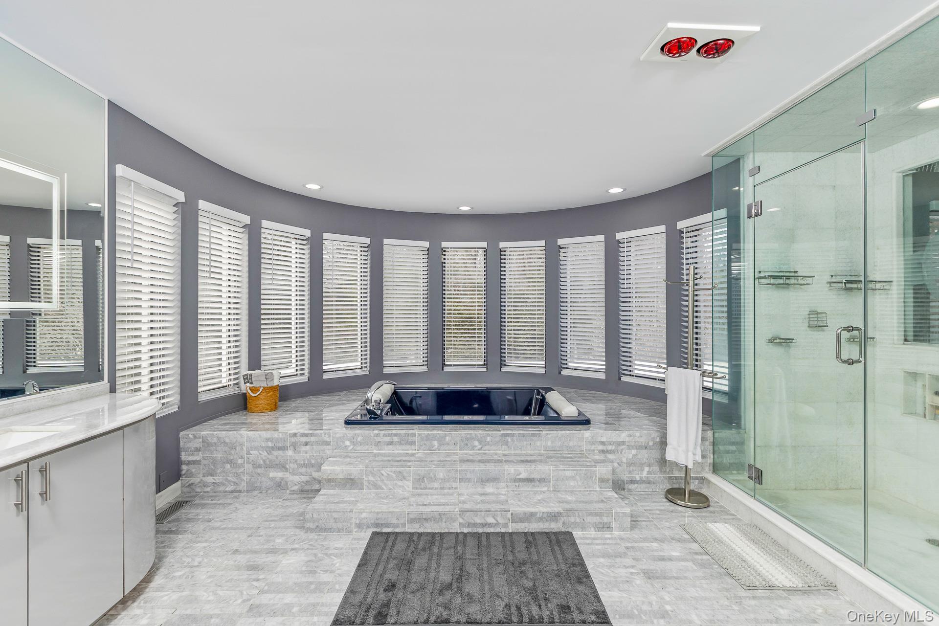 83 Cliff Road Port Jefferson, NY 11777 - Photo 45 of 50 a living room with furniture and a floor to ceiling window