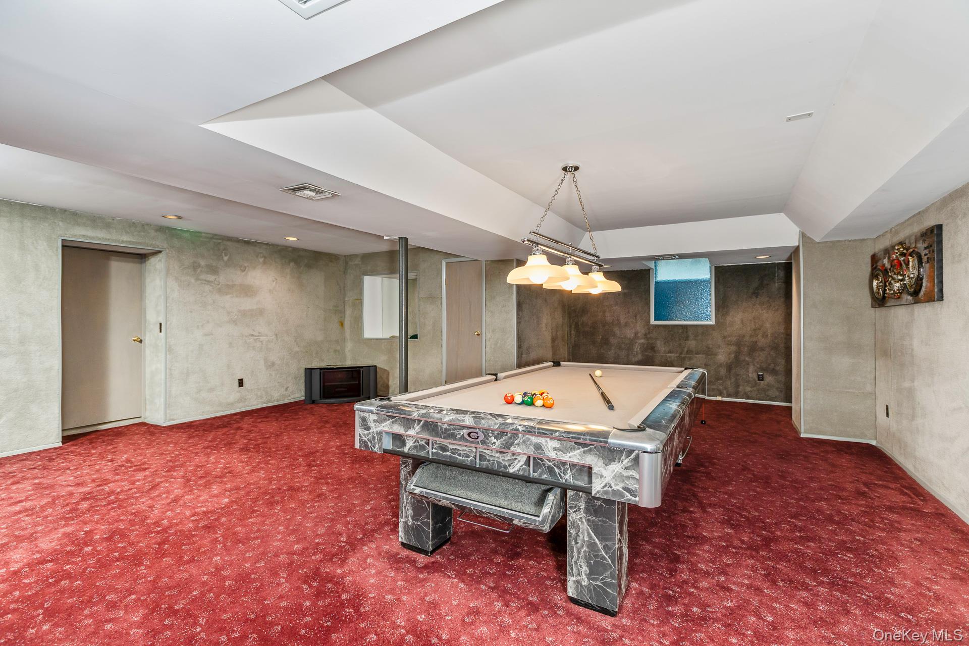 83 Cliff Road Port Jefferson, NY 11777 - Photo 46 of 50 a room with pool table and windows