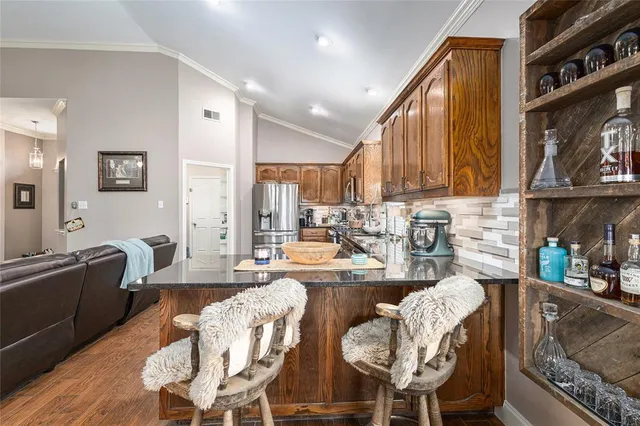 a room with a bed and a mirror