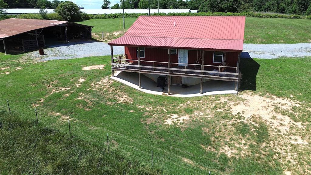 765 Addison Road Buchanan, GA 30113 - Photo 47 of 50 a view of a backyard with sitting area