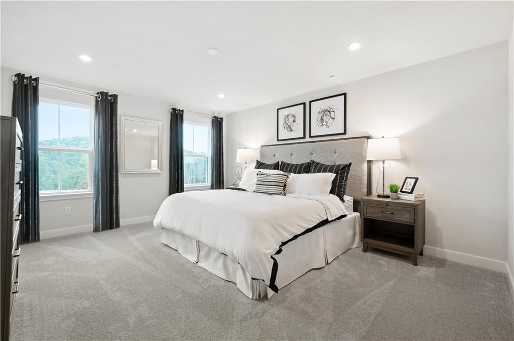 227 Elk Rdg Drive Moon Township, PA 15108 - Photo 12 of 19 a spacious bedroom with a bed and a lamp