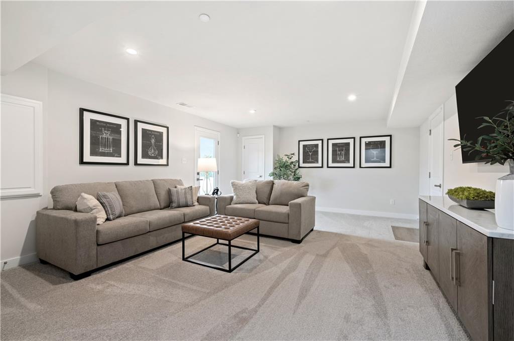 227 Elk Rdg Drive Moon Township, PA 15108 - Photo 17 of 19 a living room with furniture and a flat screen tv