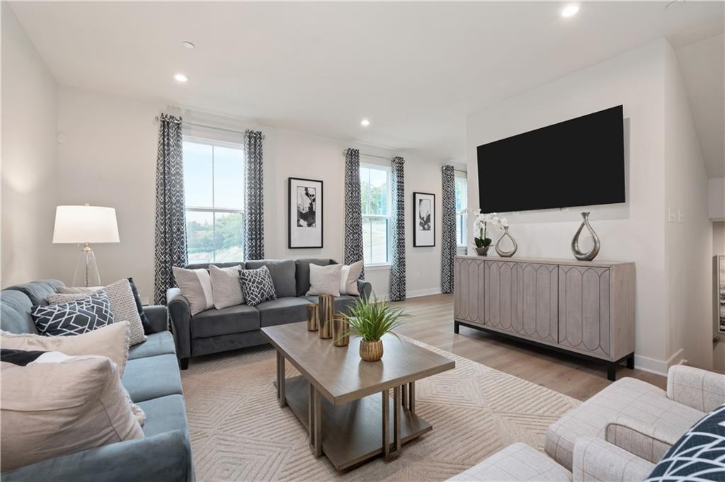 227 Elk Rdg Drive Moon Township, PA 15108 - Photo 9 of 19 a living room with furniture and a flat screen tv